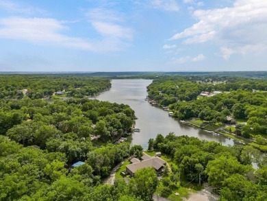 Love the peaceful lakeside living and exciting recreational on Linn Valley Lakes - Deer Trace Golf Course in Kansas - for sale on GolfHomes.com, golf home, golf lot