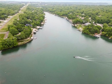 Love the peaceful lakeside living and exciting recreational on Linn Valley Lakes - Deer Trace Golf Course in Kansas - for sale on GolfHomes.com, golf home, golf lot
