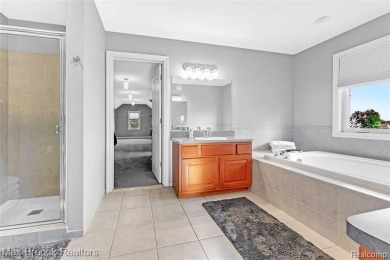 Welcome to this stunning colonial brick home in the highly on The Orchards Golf Club in Michigan - for sale on GolfHomes.com, golf home, golf lot