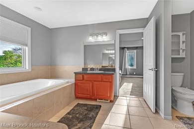 Welcome to this stunning colonial brick home in the highly on The Orchards Golf Club in Michigan - for sale on GolfHomes.com, golf home, golf lot