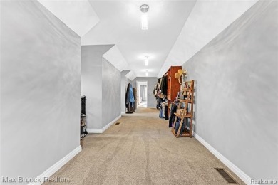 Welcome to this stunning colonial brick home in the highly on The Orchards Golf Club in Michigan - for sale on GolfHomes.com, golf home, golf lot