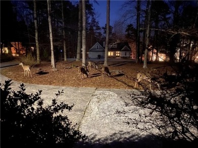 Discover this charming 3-bedroom, 2-bath ranch-style home on Fairfield Plantation Golf and Country Club in Georgia - for sale on GolfHomes.com, golf home, golf lot