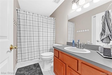Welcome to this stunning colonial brick home in the highly on The Orchards Golf Club in Michigan - for sale on GolfHomes.com, golf home, golf lot
