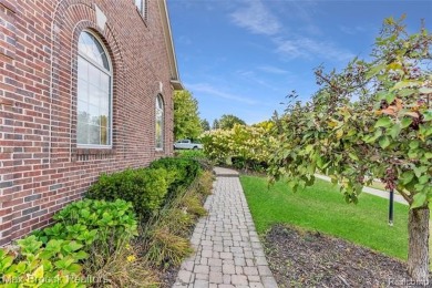 Welcome to this stunning colonial brick home in the highly on The Orchards Golf Club in Michigan - for sale on GolfHomes.com, golf home, golf lot