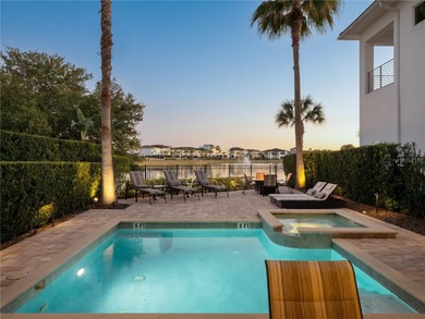 Nestled in the exclusive Reunion Golf Resort, this stunning and on ChampionsGate Golf Resort in Florida - for sale on GolfHomes.com, golf home, golf lot