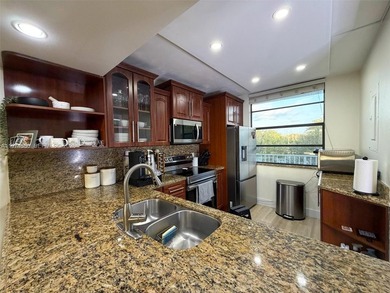 Spacious 2BR/2BA condo offering 1,385 sq ft in the desirable on Pine Island Ridge Country Club in Florida - for sale on GolfHomes.com, golf home, golf lot