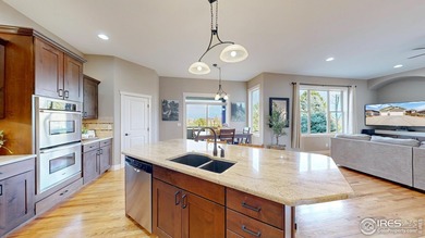 Nestled on a quiet cul de sac in coveted Highland Meadows Golf on Highland Meadows Golf Course in Colorado - for sale on GolfHomes.com, golf home, golf lot