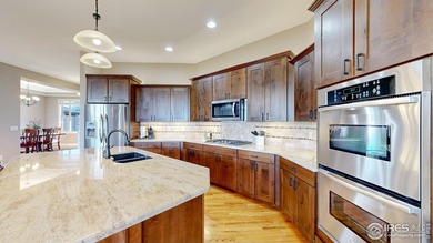 Nestled on a quiet cul de sac in coveted Highland Meadows Golf on Highland Meadows Golf Course in Colorado - for sale on GolfHomes.com, golf home, golf lot