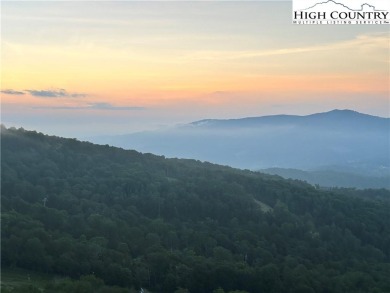 Amazing long range views, ski slope views and a fully furnished on Sugar Mountain Golf Course in North Carolina - for sale on GolfHomes.com, golf home, golf lot
