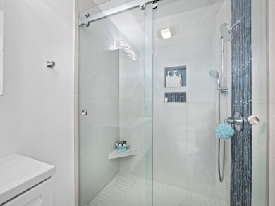 Beautifully renovated and offered turnkey furnished, this 3BR/3 on Longboat Key Golf Club Resort in Florida - for sale on GolfHomes.com, golf home, golf lot