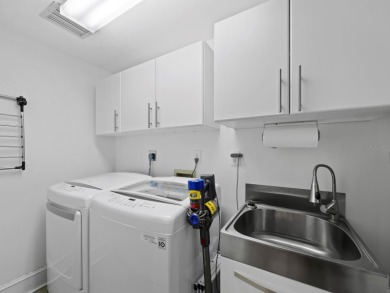 Beautifully renovated and offered turnkey furnished, this 3BR/3 on Longboat Key Golf Club Resort in Florida - for sale on GolfHomes.com, golf home, golf lot
