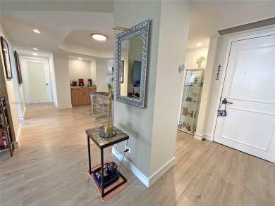 Experience luxury living with million-dollar views in this on Turnberry Isle Resort and Club in Florida - for sale on GolfHomes.com, golf home, golf lot