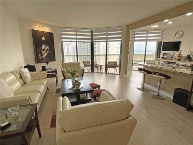Experience luxury living with million-dollar views in this on Turnberry Isle Resort and Club in Florida - for sale on GolfHomes.com, golf home, golf lot