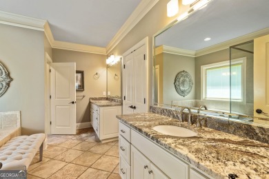 DISCOVER EXCEPTIONAL LAKEFRONT LIVING in the highly sought-after on Summergrove Golf Club in Georgia - for sale on GolfHomes.com, golf home, golf lot