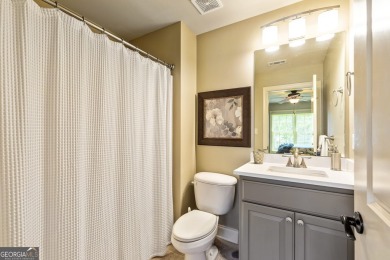 DISCOVER EXCEPTIONAL LAKEFRONT LIVING in the highly sought-after on Summergrove Golf Club in Georgia - for sale on GolfHomes.com, golf home, golf lot