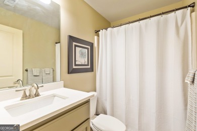 DISCOVER EXCEPTIONAL LAKEFRONT LIVING in the highly sought-after on Summergrove Golf Club in Georgia - for sale on GolfHomes.com, golf home, golf lot