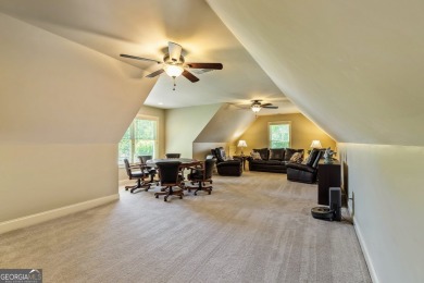 DISCOVER EXCEPTIONAL LAKEFRONT LIVING in the highly sought-after on Summergrove Golf Club in Georgia - for sale on GolfHomes.com, golf home, golf lot