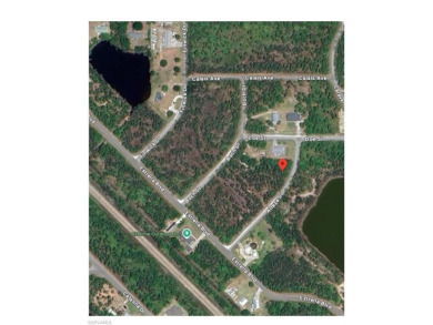 Beautiful vacant lot in Tropical Gulf Acres, offering peace on Seminole Lakes Country Club in Florida - for sale on GolfHomes.com, golf home, golf lot