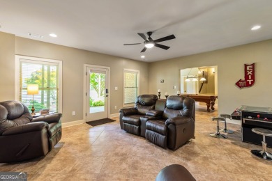 DISCOVER EXCEPTIONAL LAKEFRONT LIVING in the highly sought-after on Summergrove Golf Club in Georgia - for sale on GolfHomes.com, golf home, golf lot