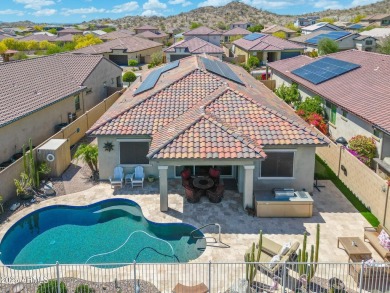 This stunning oasis is located on the 16th hole in Estrella's on Estrella Mountain Ranch Golf Course in Arizona - for sale on GolfHomes.com, golf home, golf lot
