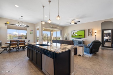 This stunning oasis is located on the 16th hole in Estrella's on Estrella Mountain Ranch Golf Course in Arizona - for sale on GolfHomes.com, golf home, golf lot