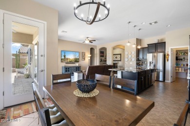 This stunning oasis is located on the 16th hole in Estrella's on Estrella Mountain Ranch Golf Course in Arizona - for sale on GolfHomes.com, golf home, golf lot
