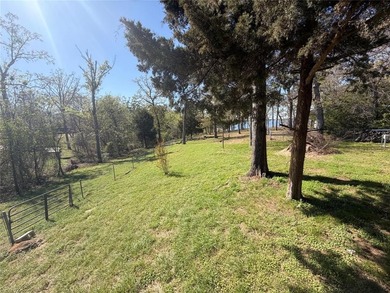 Discover the perfect waterfront getaway on Lake Fork! This on Links At Lands End in Texas - for sale on GolfHomes.com, golf home, golf lot