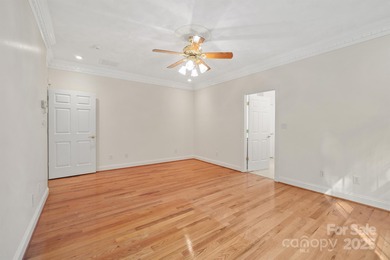 Spacious mostly brick home with main level living located in the on Granada Farms Country Club in North Carolina - for sale on GolfHomes.com, golf home, golf lot