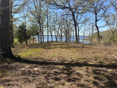Discover the perfect waterfront getaway on Lake Fork! This on Links At Lands End in Texas - for sale on GolfHomes.com, golf home, golf lot