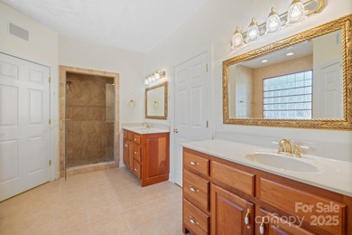 Spacious mostly brick home with main level living located in the on Granada Farms Country Club in North Carolina - for sale on GolfHomes.com, golf home, golf lot