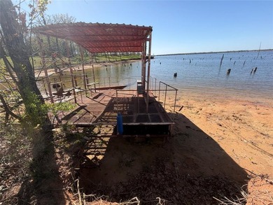 Discover the perfect waterfront getaway on Lake Fork! This on Links At Lands End in Texas - for sale on GolfHomes.com, golf home, golf lot