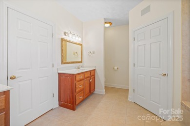 Spacious mostly brick home with main level living located in the on Granada Farms Country Club in North Carolina - for sale on GolfHomes.com, golf home, golf lot