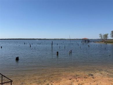 Discover the perfect waterfront getaway on Lake Fork! This on Links At Lands End in Texas - for sale on GolfHomes.com, golf home, golf lot