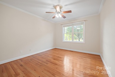 Spacious mostly brick home with main level living located in the on Granada Farms Country Club in North Carolina - for sale on GolfHomes.com, golf home, golf lot