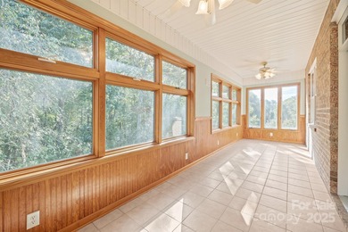 Spacious mostly brick home with main level living located in the on Granada Farms Country Club in North Carolina - for sale on GolfHomes.com, golf home, golf lot