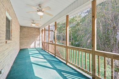 Spacious mostly brick home with main level living located in the on Granada Farms Country Club in North Carolina - for sale on GolfHomes.com, golf home, golf lot