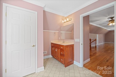 Spacious mostly brick home with main level living located in the on Granada Farms Country Club in North Carolina - for sale on GolfHomes.com, golf home, golf lot