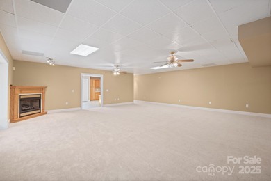 Spacious mostly brick home with main level living located in the on Granada Farms Country Club in North Carolina - for sale on GolfHomes.com, golf home, golf lot