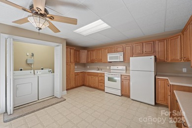 Spacious mostly brick home with main level living located in the on Granada Farms Country Club in North Carolina - for sale on GolfHomes.com, golf home, golf lot