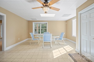 Spacious mostly brick home with main level living located in the on Granada Farms Country Club in North Carolina - for sale on GolfHomes.com, golf home, golf lot