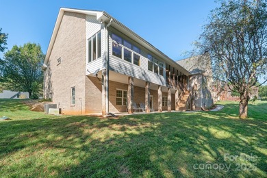 Spacious mostly brick home with main level living located in the on Granada Farms Country Club in North Carolina - for sale on GolfHomes.com, golf home, golf lot