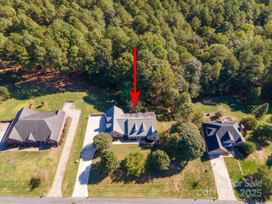 Spacious mostly brick home with main level living located in the on Granada Farms Country Club in North Carolina - for sale on GolfHomes.com, golf home, golf lot