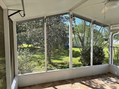 Welcome to this charming 3 bedroom, 2 bath Palm Harbor home on St. Johns Golf Club in Florida - for sale on GolfHomes.com, golf home, golf lot