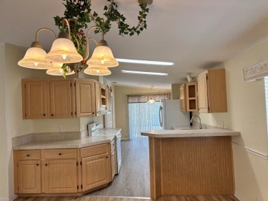 Welcome to this charming 3 bedroom, 2 bath Palm Harbor home on St. Johns Golf Club in Florida - for sale on GolfHomes.com, golf home, golf lot