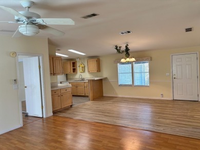 Welcome to this charming 3 bedroom, 2 bath Palm Harbor home on St. Johns Golf Club in Florida - for sale on GolfHomes.com, golf home, golf lot