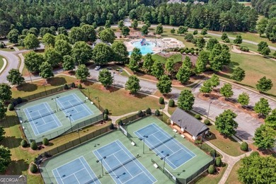Located in The Georgian, this peaceful, family-oriented on The Frog Golf Club in Georgia - for sale on GolfHomes.com, golf home, golf lot
