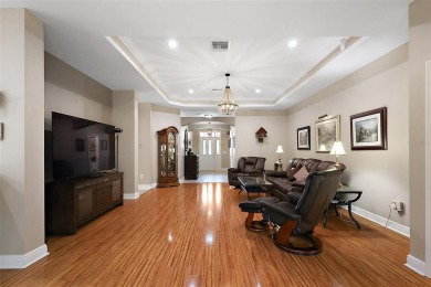 FABULOUS 3/2.5 Bridgeport with HEATED POOL, HOT TUB, and on The Links of Spruce Creek in Florida - for sale on GolfHomes.com, golf home, golf lot