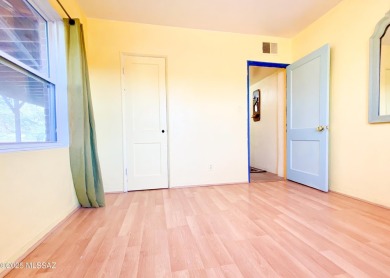 This charming solid brick home sits on a coveted 0.30-acre on Randolph Park Golf Courses in Arizona - for sale on GolfHomes.com, golf home, golf lot