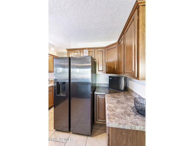 A rare opportunity in the vibrant 55+ gated community of on Fountain of the Sun Country Club in Arizona - for sale on GolfHomes.com, golf home, golf lot