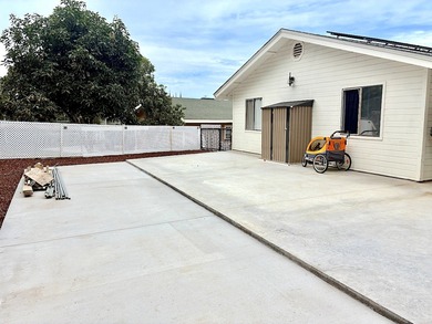 This large parcel with updated, single level 3 bed/2 bath home on Waikoloa Village Golf Club in Hawaii - for sale on GolfHomes.com, golf home, golf lot